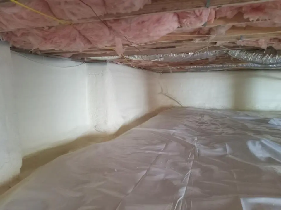 Crawl space encapsulation with closed-cell spray foam for Flat Roof Repair in Ishpeming